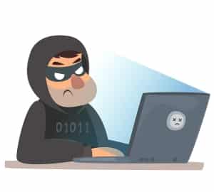 A man at a computer in a criminal mask. Computer hacking cyber attack. The villain is hacking the site. Vector illustration in cartoon childish style.